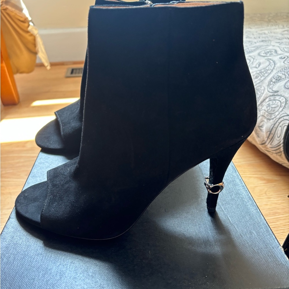 Coach Black Heeled Boots with Sleek Design